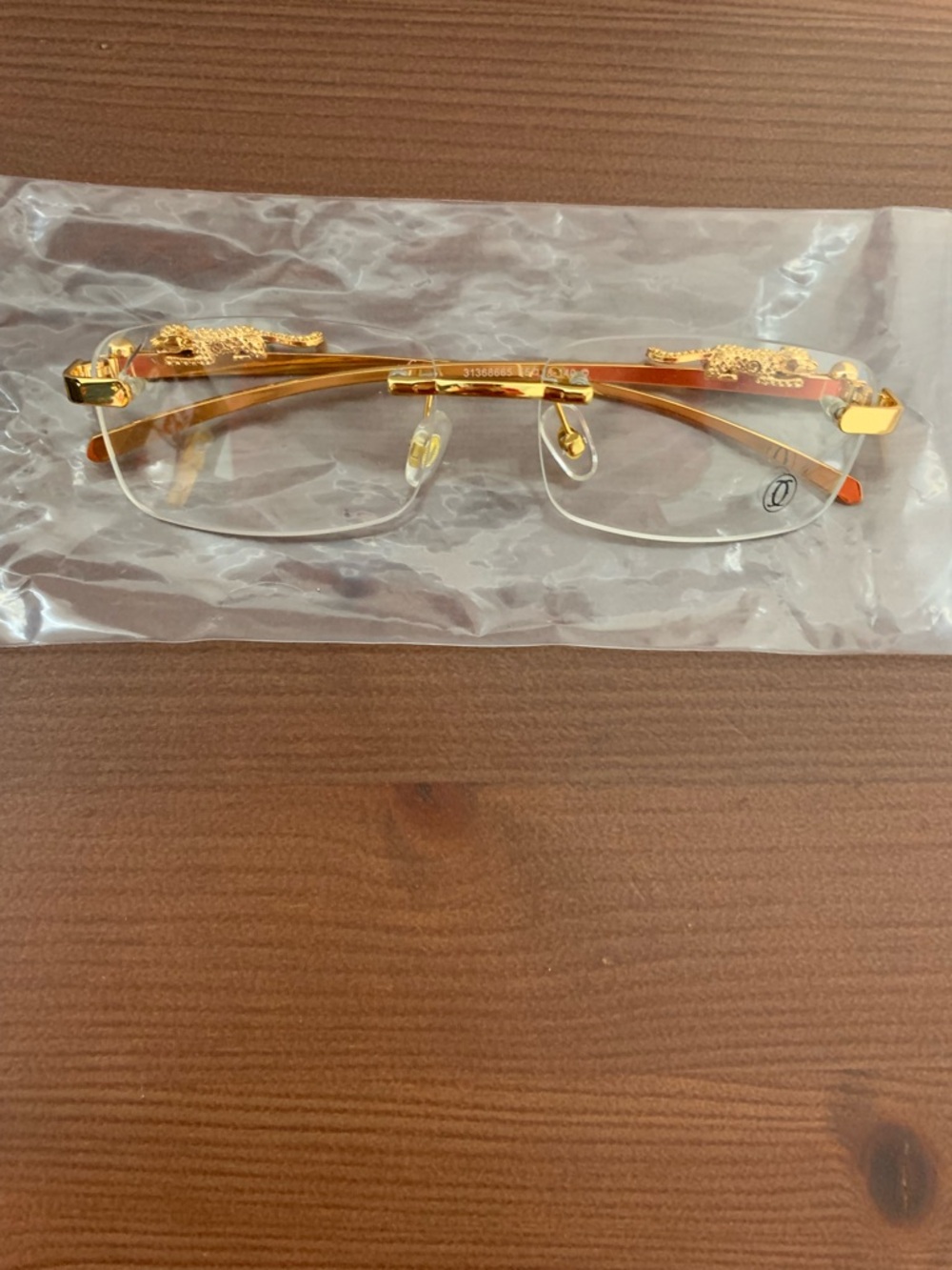 Cartier Gold Rimless Sunglasses